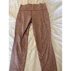 Athleta Salutation‎ Stash Pocket II 7/8 Tight Leggings Animal Print Orange M